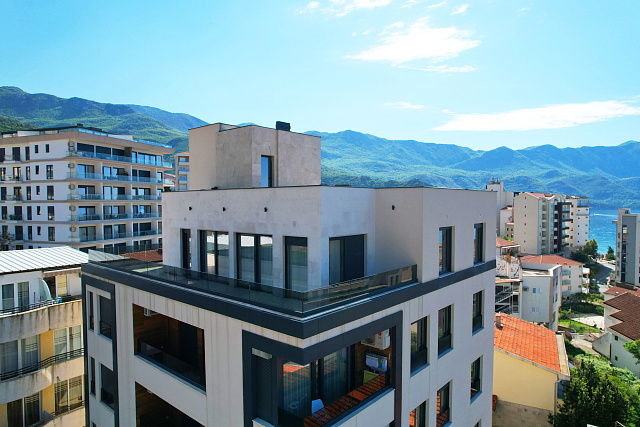 Penthouse in einem Neubau in Becici in der Nähe des Meeres — photo 44