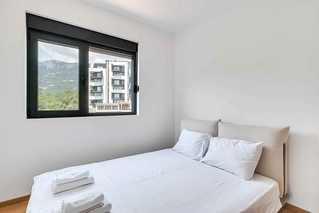 Möblierte Wohnung mit einem Schlafzimmer, Meerblick und Garagenplatz in einem neuen Gebäude — photo 14